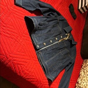 Stylish Blue Denim Jacket with Unique Button Detail